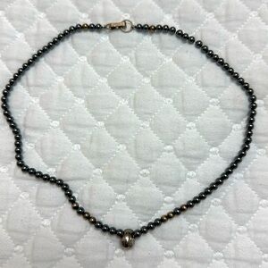 Vintage Mignon Faget - Black Pearl Necklace
16 inch with Sterling Silver Clasp
